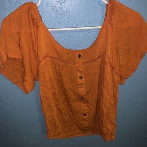 A orange blouse
